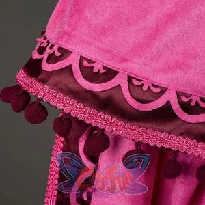 Princess Anna cosplay cape hem detail traces scalloped cutwork above braided trim and dark pom-pom tassels.