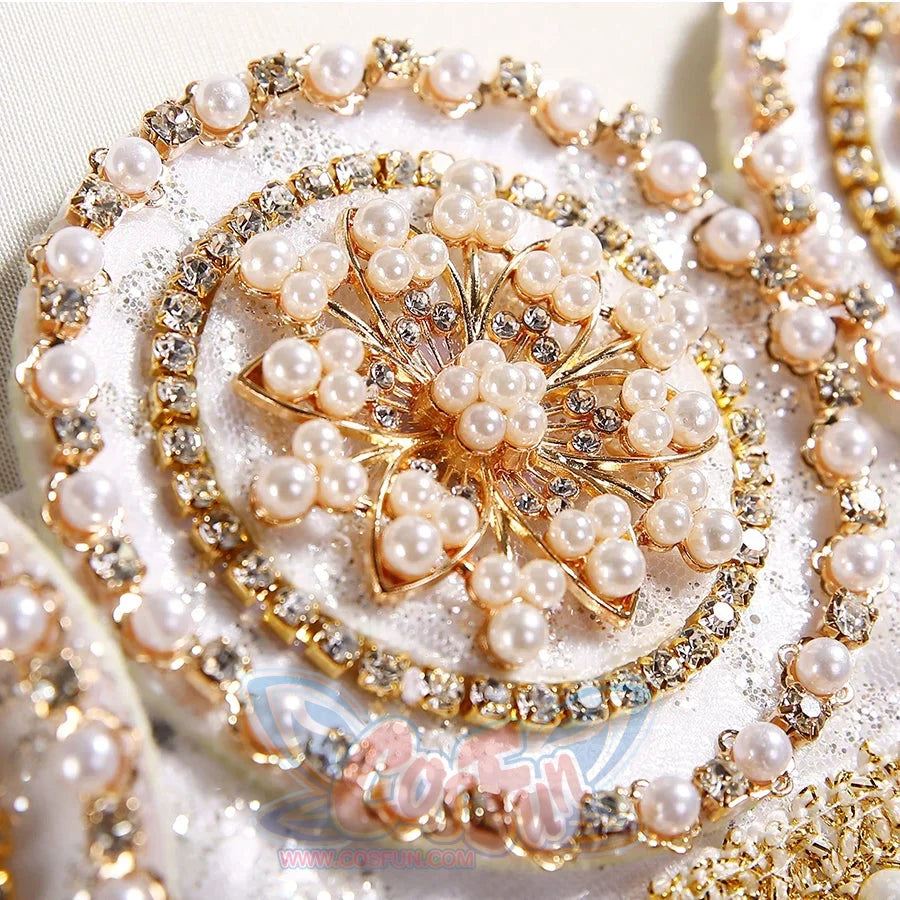 Sailor Soldiers Princess Serenity cosplay gown bodice detail gathers pearl-like beads around a floral ornament.