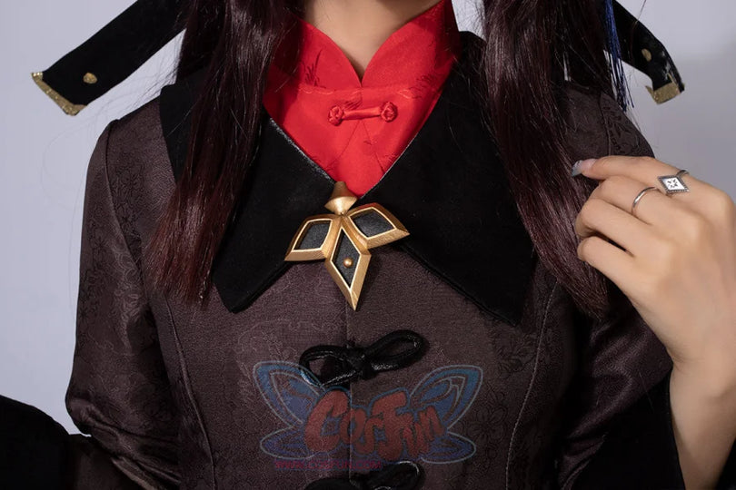 Genshin Impact Hu Tao cosplay jacket anchors a gold geometric lapel accent above a red mandarin collar frog closure.