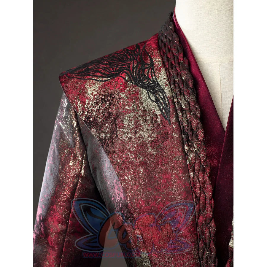 Rhaenyra Targaryen cosplay costume traces black shoulder trim across patterned burgundy fabric.