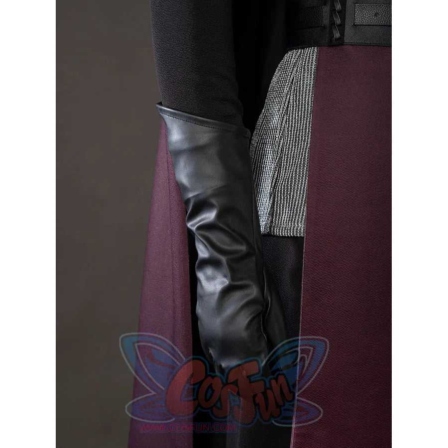 Rhaenyra Targaryen cosplay glove detail layers black faux leather over the sleeve beside gray fabric.