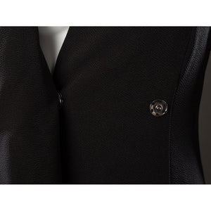 Rhaenyra Targaryen cosplay inner robe snap detail sets a small black fastener into textured fabric.
