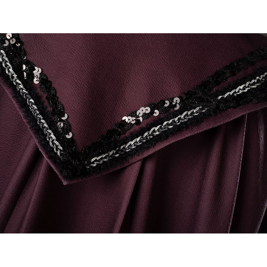 Rhaenyra Targaryen cosplay robe trim close-up textures maroon fabric below black sequined edging.