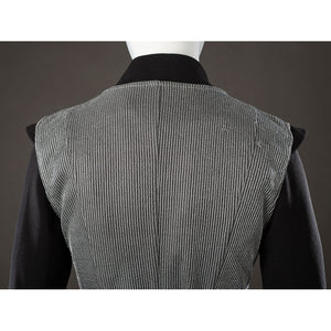 Rhaenyra Targaryen cosplay vest back panel detail keeps fine gray ribbing beneath a black collar.