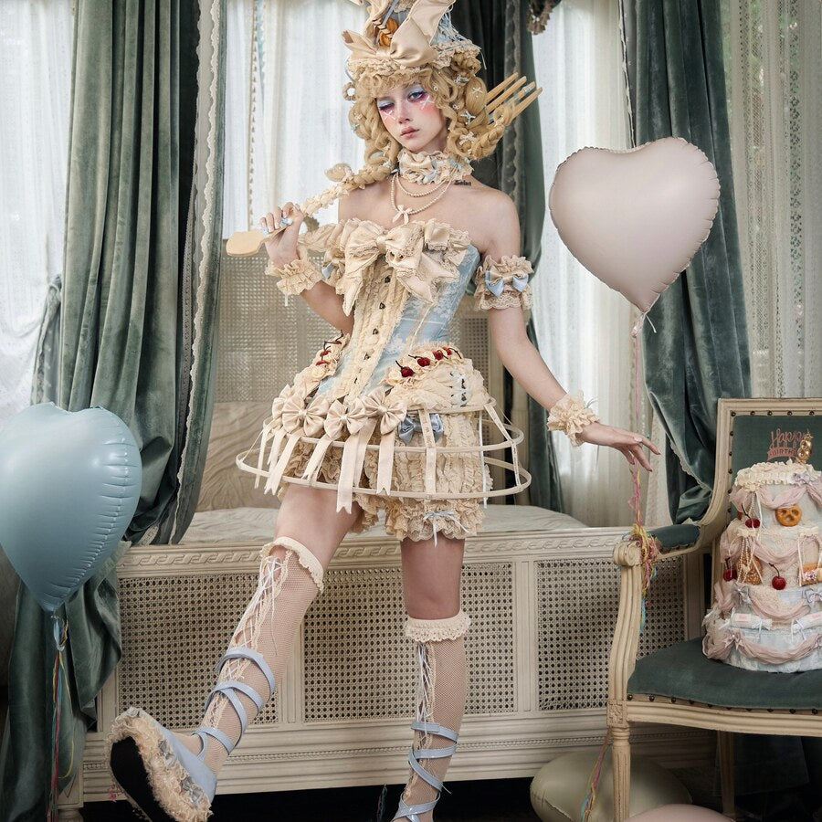 Cream Rococo Lolita styling with pumpkin bloomers and pale blue ribbon accents