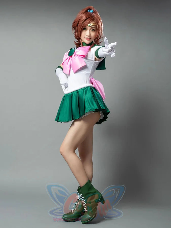 Sailor Jupiter cosplay costume styled pose balances the pink chest bow above green skirt panels