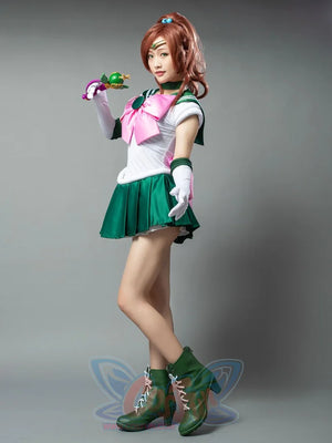 Sailor Jupiter cosplay collar detail frames green trim above the white bodice and pink bow
