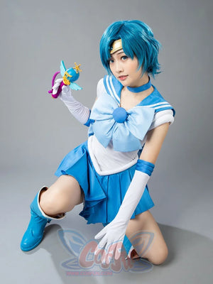 Sailor Mercury cosplay costume styled pose angles the sailor bodice above bright blue pleats