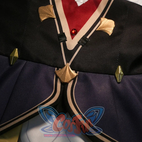 Front panel detail of Sandrone cosplay costume with black fabric, burgundy strap, gold trim, and hanging gold piece