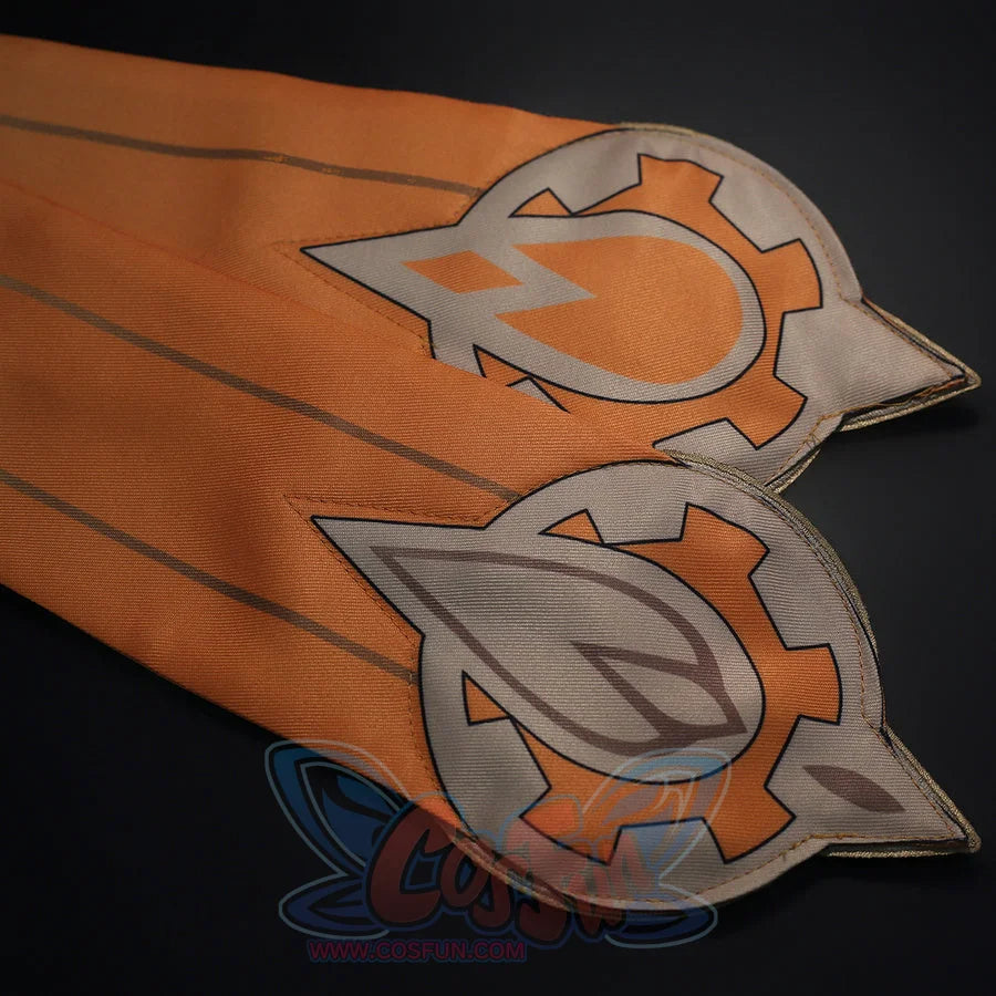 Orange hem detail of Sandrone cosplay costume with gray printed symbols, dark outlines, and pointed panel tips