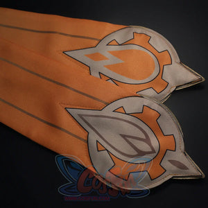 Orange hem detail of Sandrone cosplay costume with gray printed symbols, dark outlines, and pointed panel tips