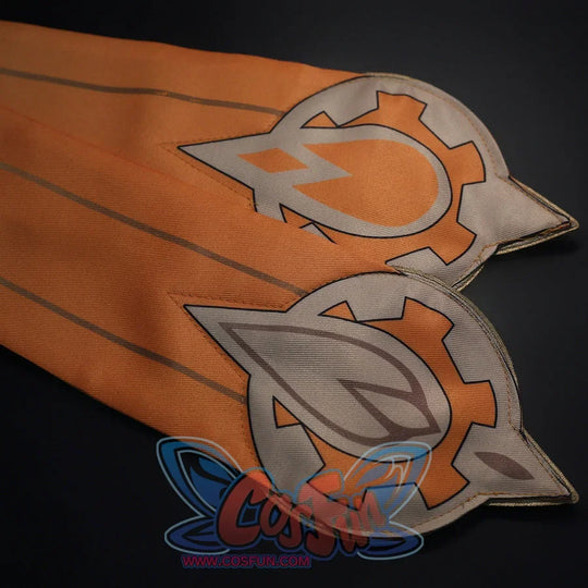 Orange hem detail of Sandrone cosplay costume with gray printed symbols, dark outlines, and pointed panel tips