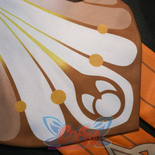 Orange panel detail of Sandrone cosplay costume with white and gold printed motif, dark edge, and layered hem