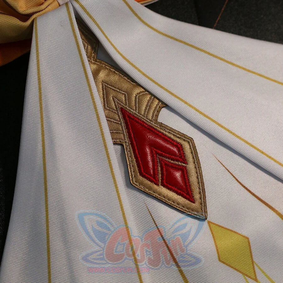 Close-up of Sandrone cosplay costume red badge with gold trim on white fabric and yellow diamond accent
