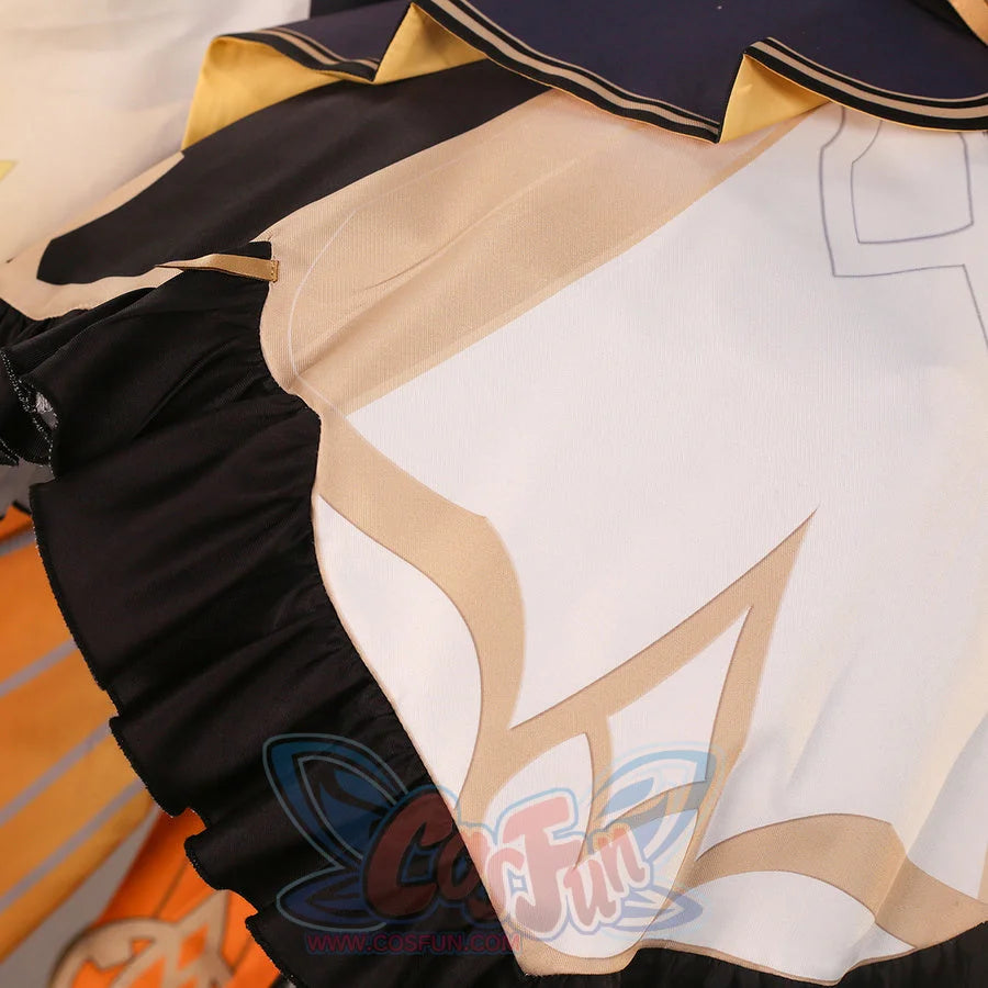 White skirt panel detail of Sandrone cosplay costume with beige print, black ruffle edge, and orange underlayer