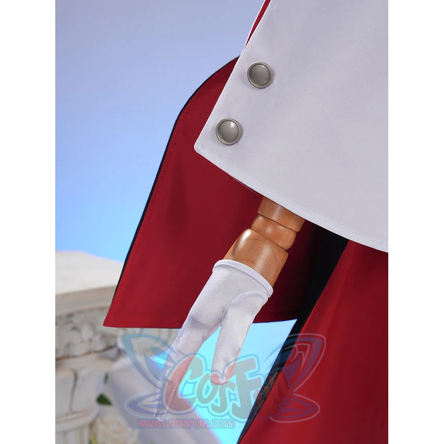 Sapphire cosplay costume layers a white capelet with silver-tone buttons over a red jacket and a fitted white fabric glove.