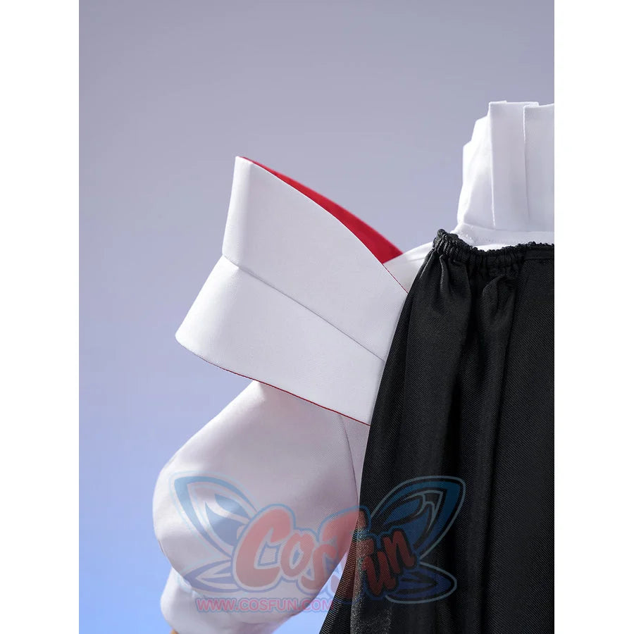 Sapphire cosplay costume frames the white shoulder capelet with red interior lining and black fabric gathered elements.