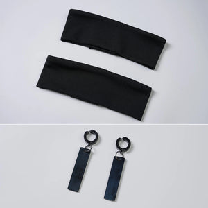 Sapphire cosplay costume frames the face with simple black headbands and coordinates with sleek hanging drop earrings.