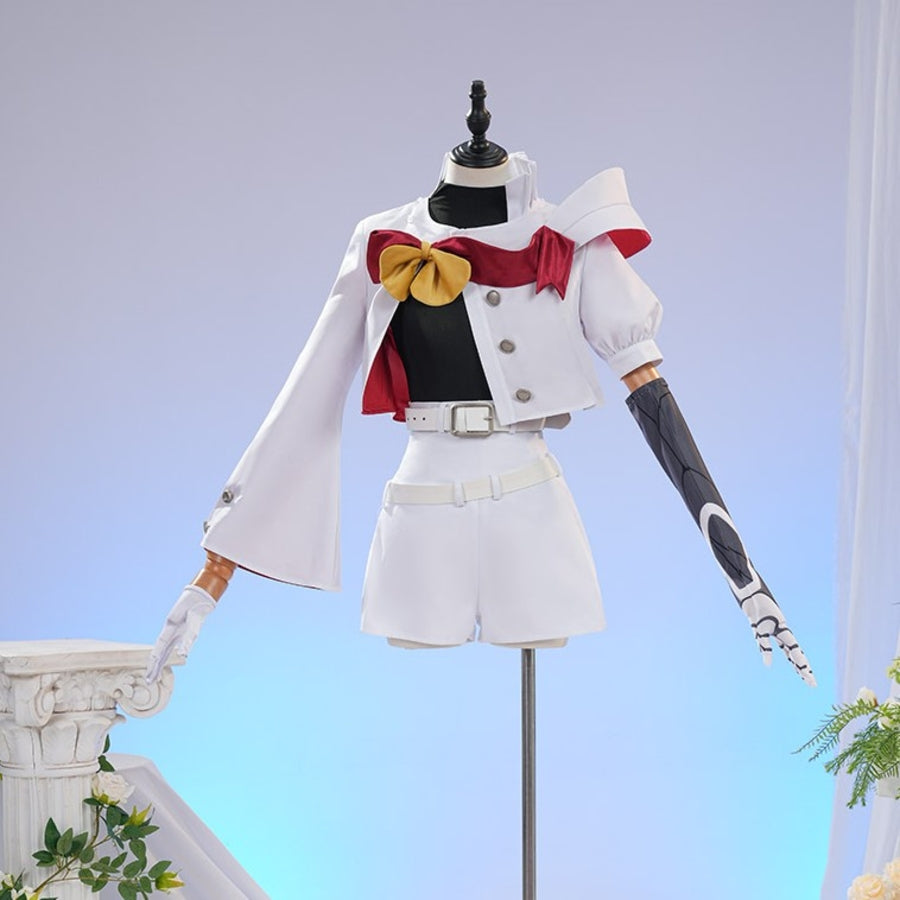 Sapphire cosplay costume layers a structured white jacket over a black top and white shorts with a decorative red capelet.
