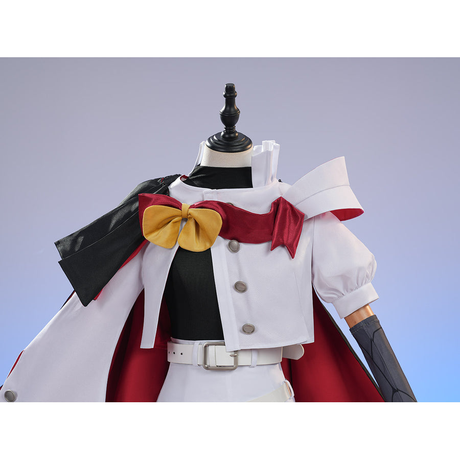 Sapphire cosplay costume layers a red bow over the white jacket while a black and red capelet drapes across the shoulders.