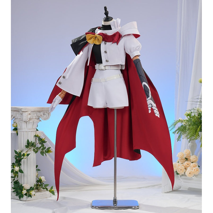 Sapphire cosplay costume layers a red capelet over a white jacket and matching shorts with detailed belts and sleeve armor.