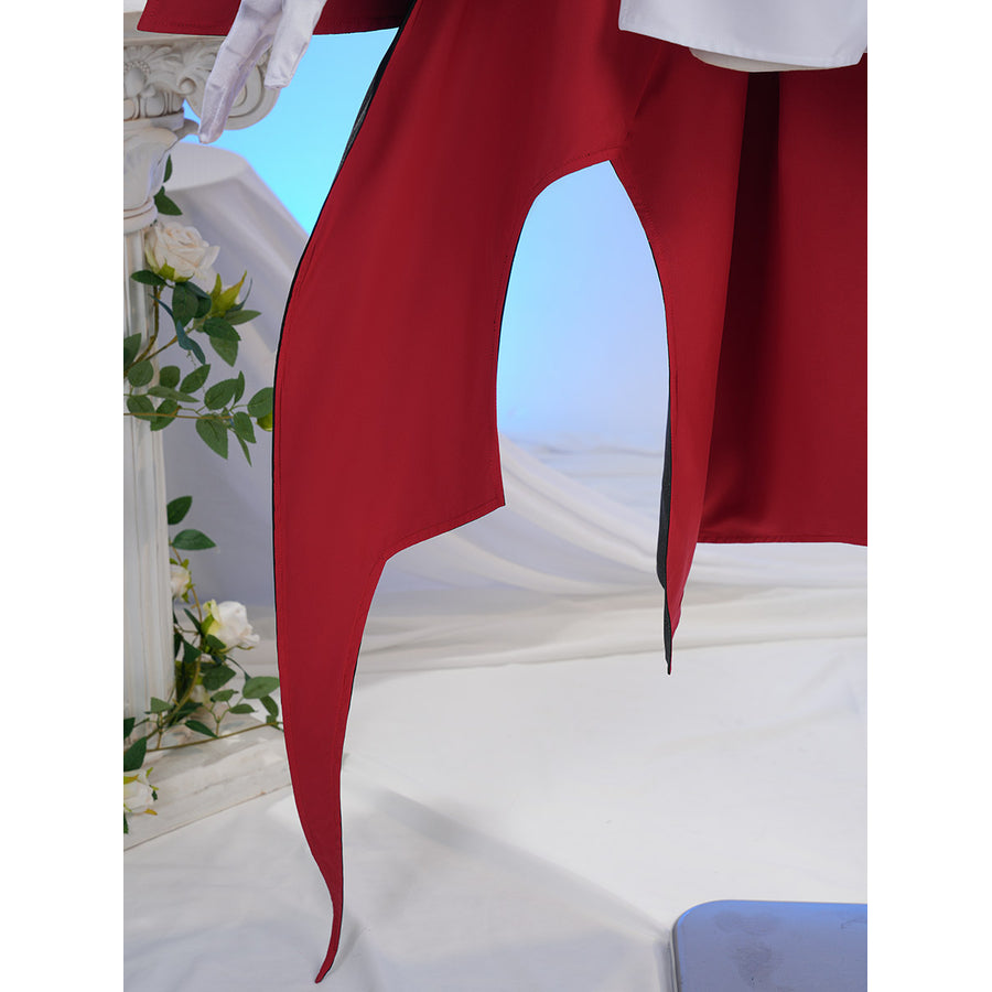 Sapphire cosplay costume frames the red capelet with a sharp pointed hem that gathers around the uniform cloth jacket.