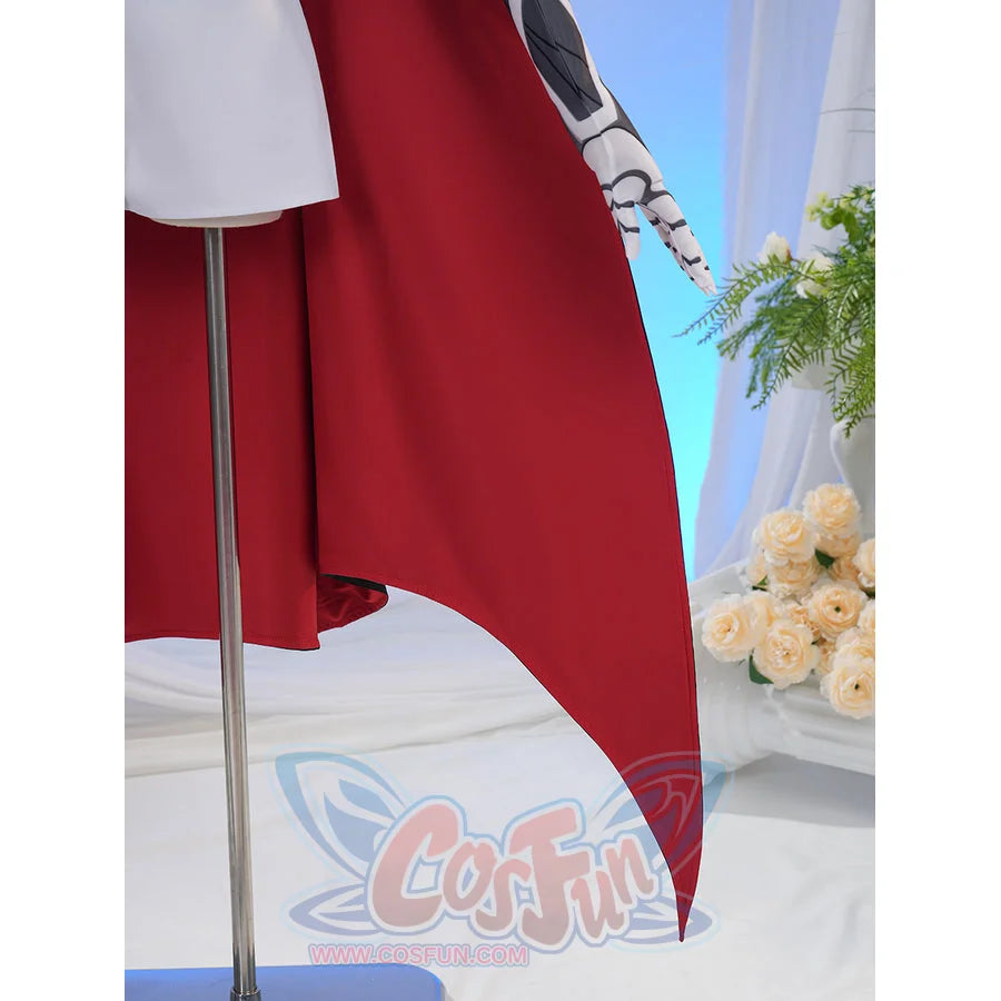Sapphire cosplay costume layers a long red capelet over a white jacket while a white sleeve extends from the right side.