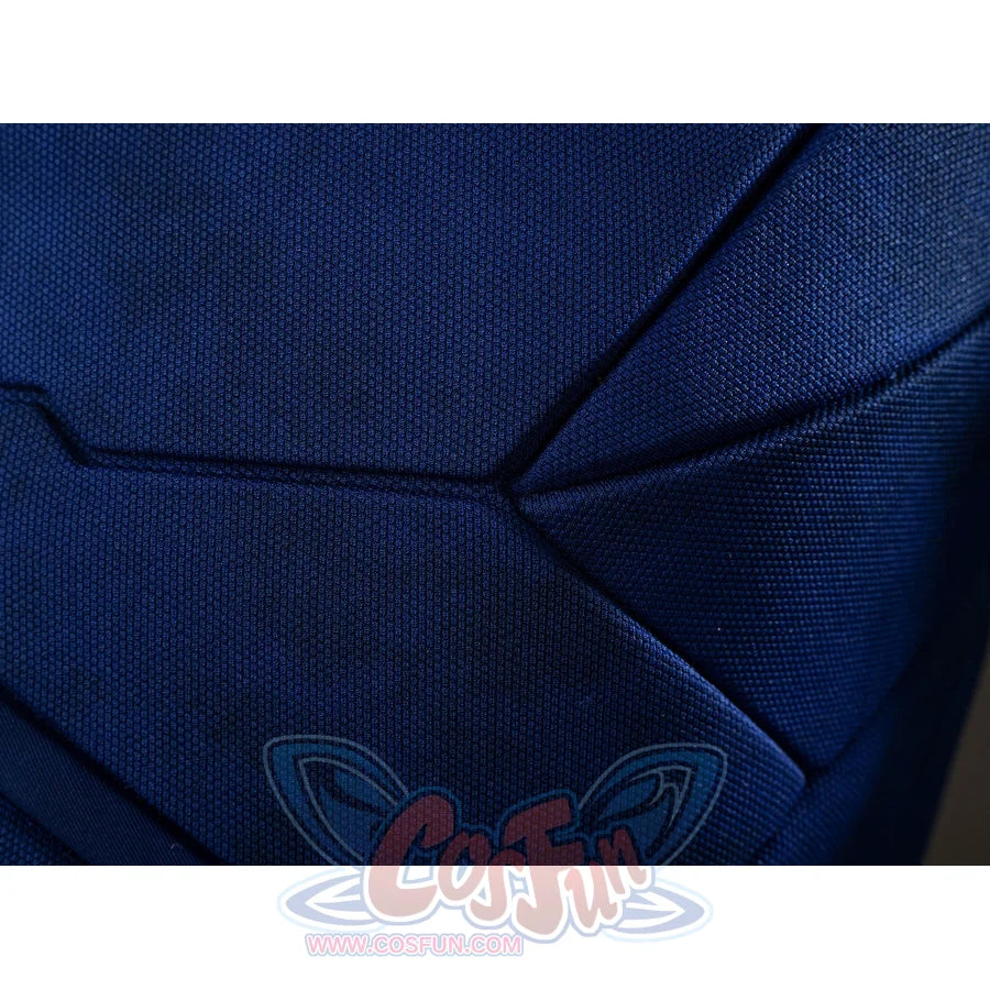 Scott Summers cosplay fabric close-up traces textured blue weave along raised seam lines.