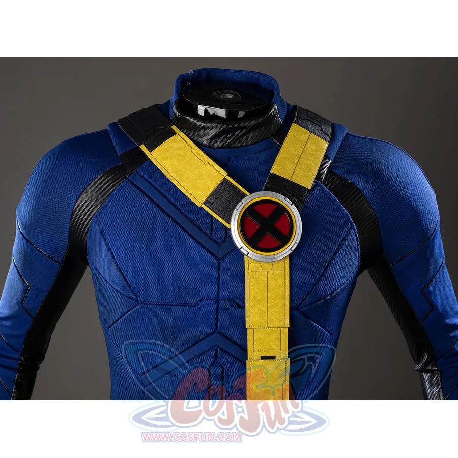 Scott Summers cosplay chest harness detail anchors yellow straps over blue torso seams and black shoulder panels.