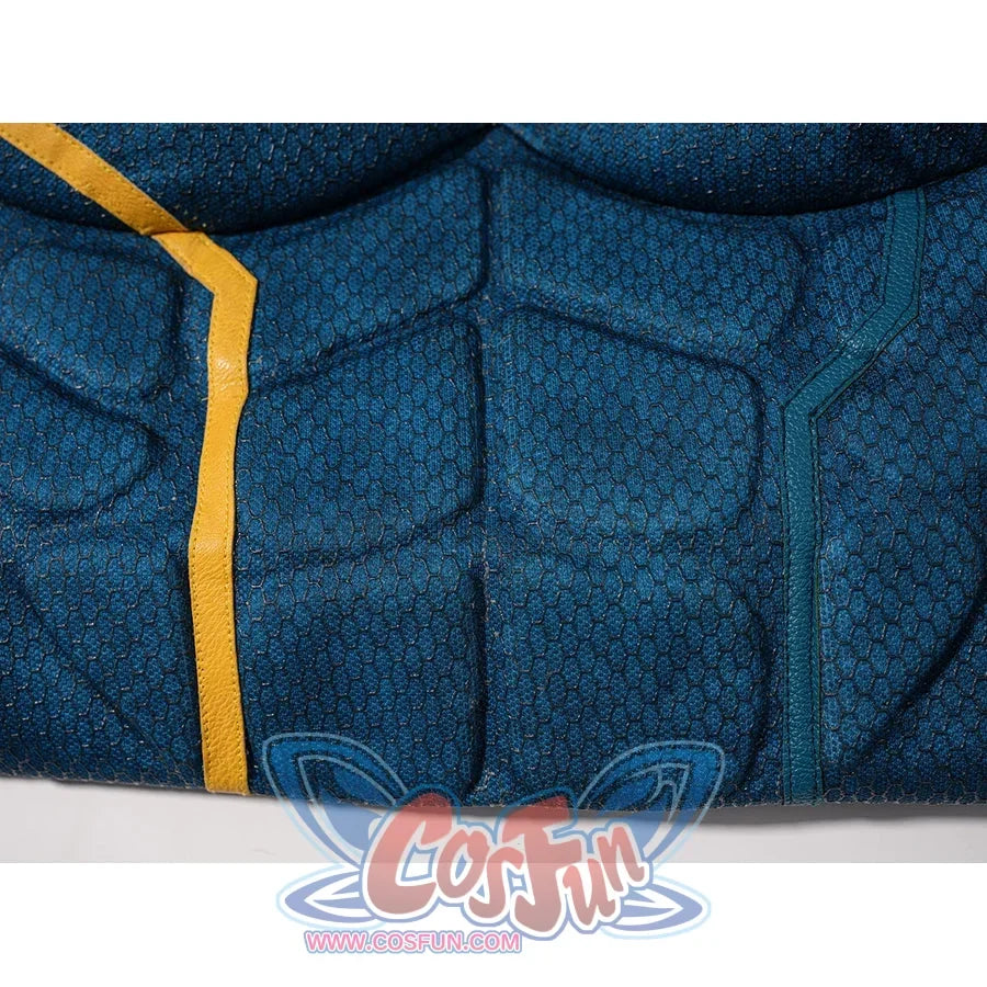 Scott Summers cosplay torso detail with raised blue-green panels bordered by yellow piping.