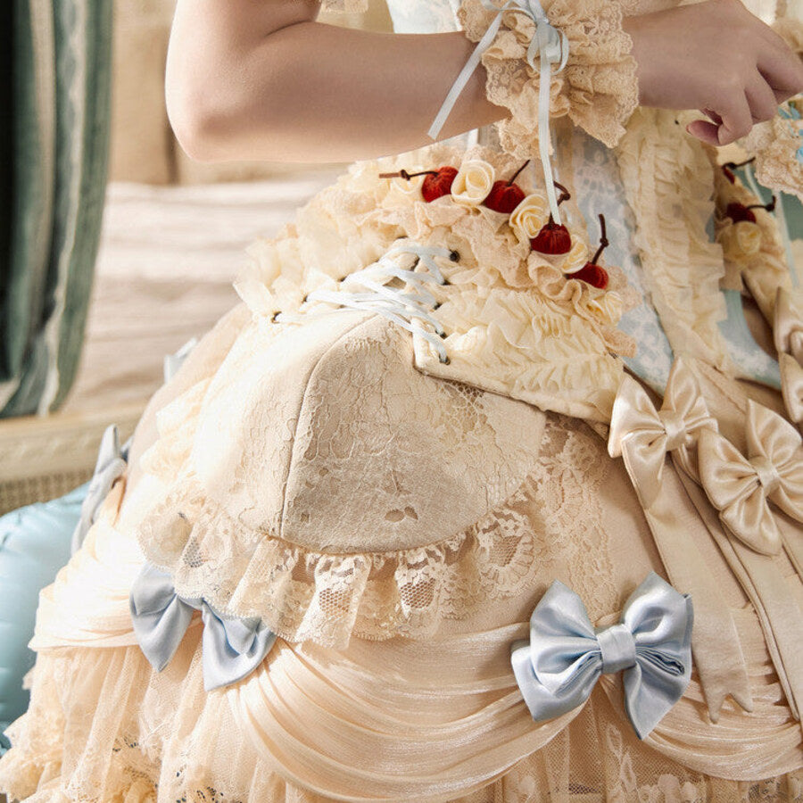 Detail view of the Pannier Hip Pads item with padded side volume, cherry accents, lace ruffles, and bows