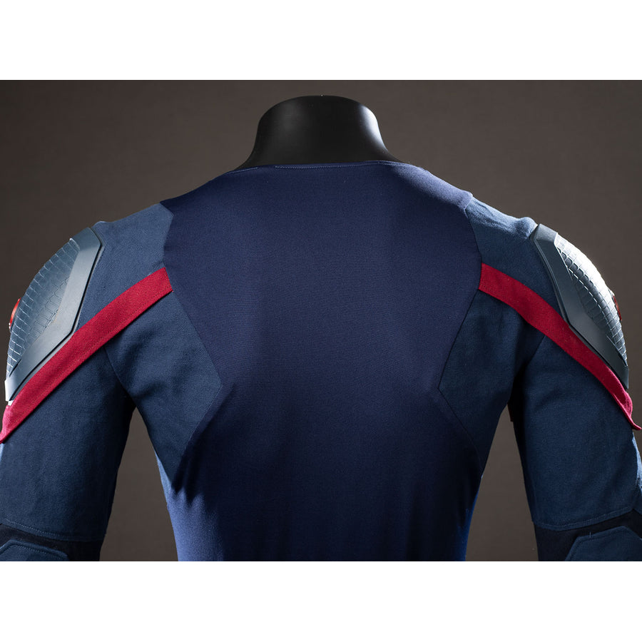 Steve Rogers cosplay jumpsuit back detail contrasts navy stretch fabric against red shoulder stripes.