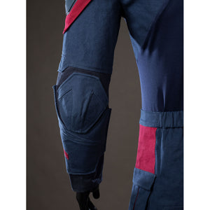 Steve Rogers cosplay leg guard detail layers navy knee armor above a red side panel.