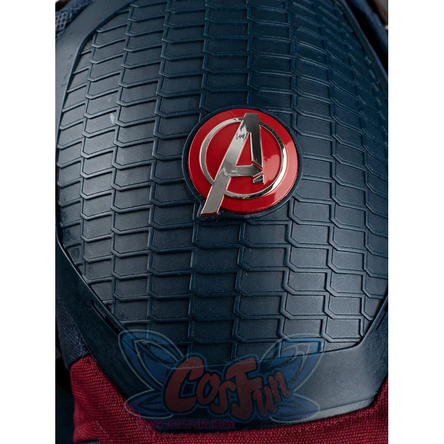 Steve Rogers cosplay centers blue textured shoulder armor piece with central red and silver-tone metal emblem.