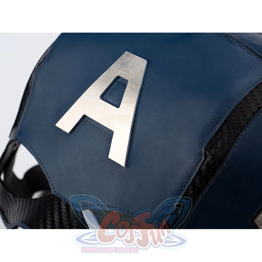 Steve Rogers cosplay helmet emblem close-up centers a silver-tone letter mark over blue panels.