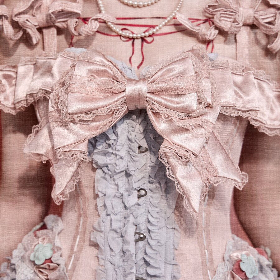 Close-up of the corset bodice with satin bow, front buttons, and blue ruffle panel