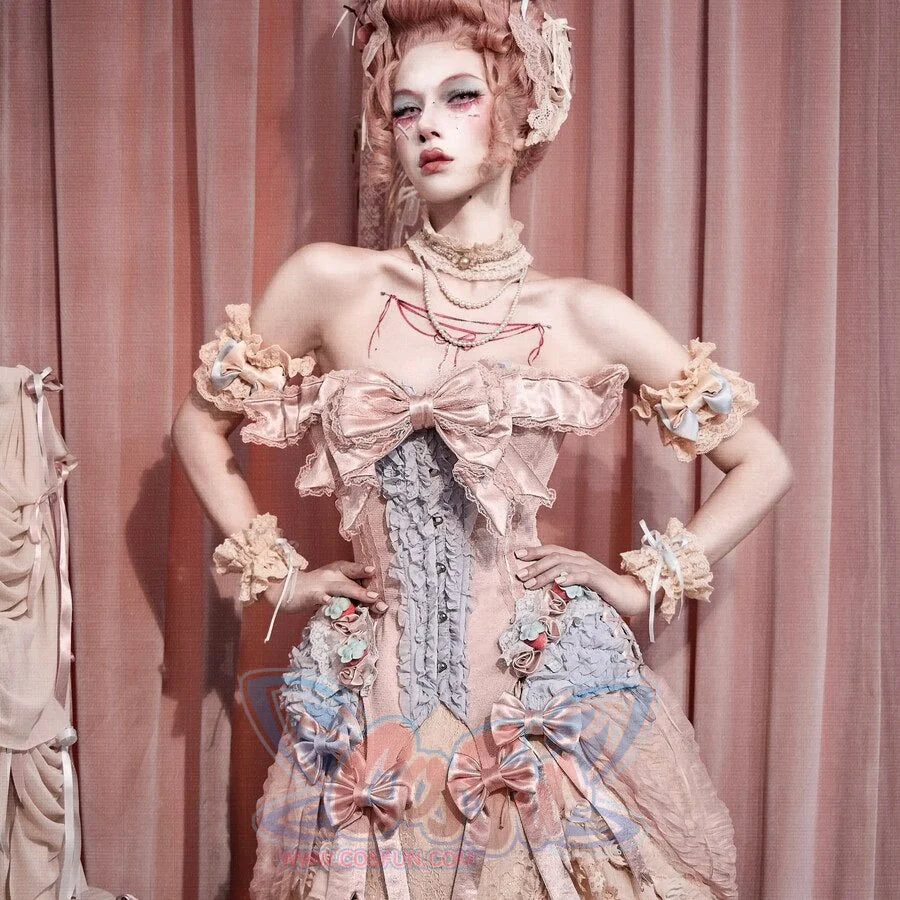 Front view of the Strawberry Mousse Corset item with layered satin bows and lace trim