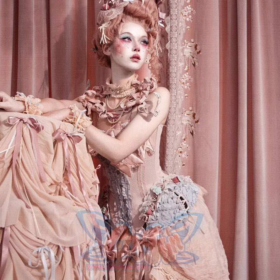 Seated styling showing the Strawberry Mousse Corset item with a ruffled skirt coordinate