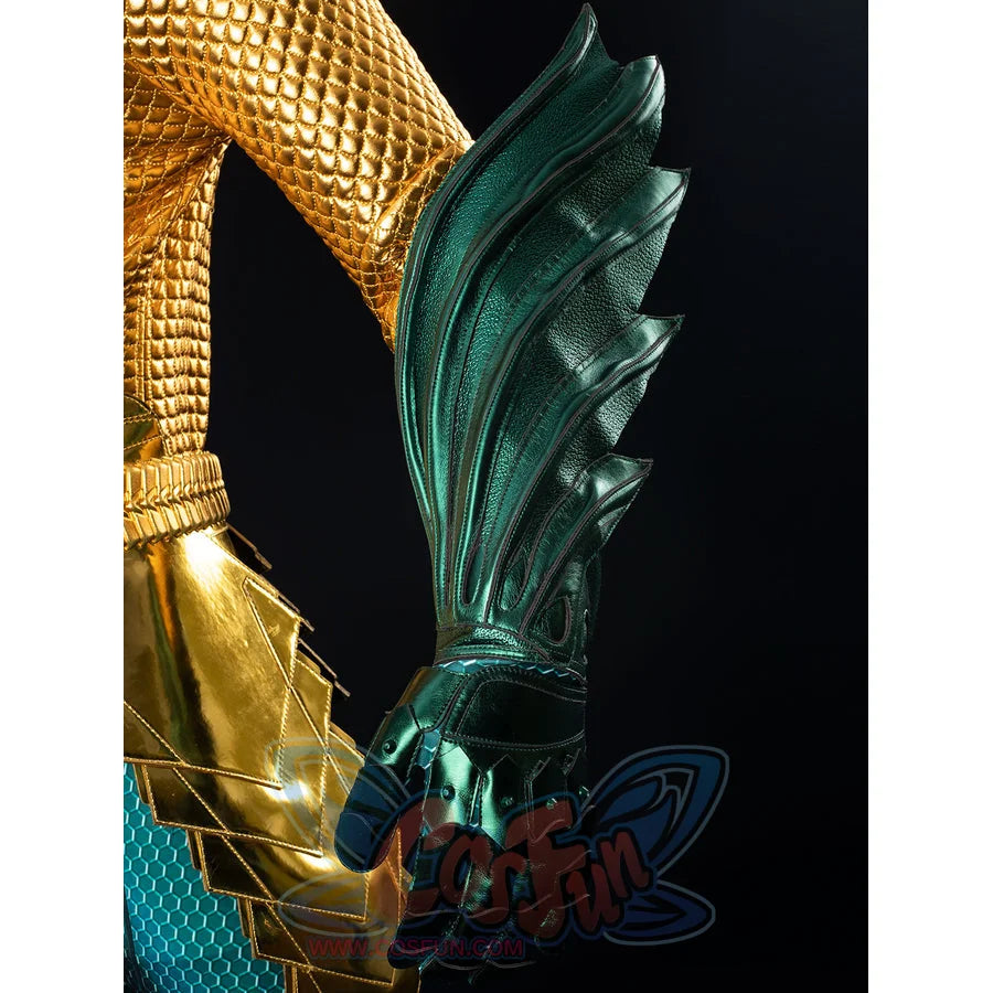 Teal armored cosplay wrist guard detail layers fin-like panels beside a gold-tone hip guard.