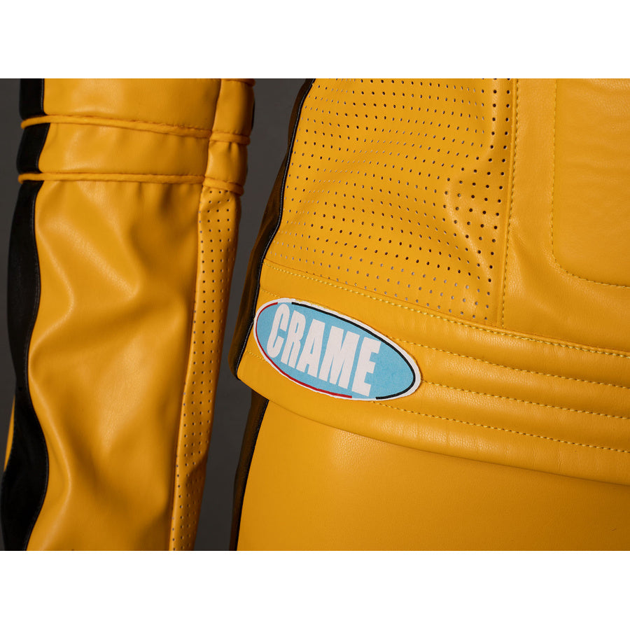 Detail of The Bride cosplay jacket side panel with perforated yellow PU leather, lower hem stitching and small patch