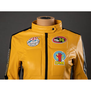 Close-up of The Bride cosplay jacket upper front with stand collar, black zipper, shoulder stripes and chest patches