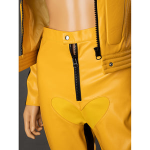 Close-up of The Bride cosplay pants front waist with snap closure, black zipper and heart-shaped yellow front panel