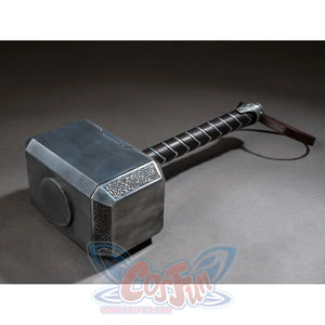 Thor cosplay hammer centers the etched metal block while a dark wrapped handle curves toward a brown faux leather loop.