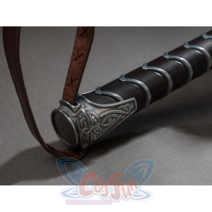 Thor cosplay hammer handle gathers a dark wrap with silver-tone metal coils and secures a brown strap at the base end.
