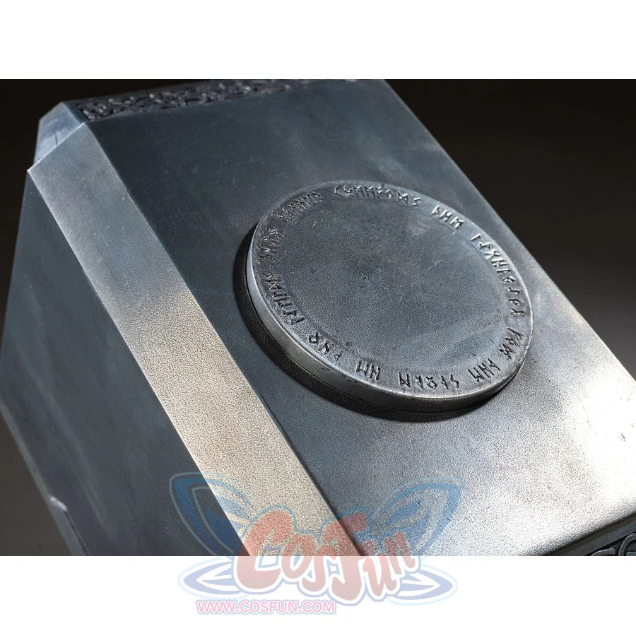 Thor cosplay hammer surfaces trace intricate circular runic inscriptions on the metallic block for an authentic look.