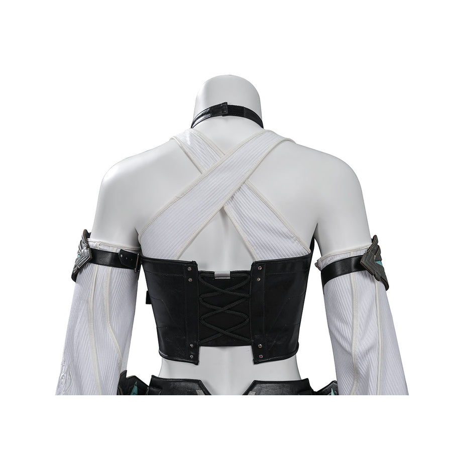 Tifa cosplay costume traces the back corset lacing of a black faux leather vest layered over a white ribbed cross-strap top.