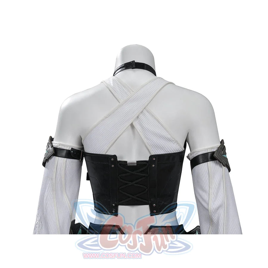 Tifa cosplay costume traces the back corset lacing of a black faux leather vest layered over a white ribbed cross-strap top.
