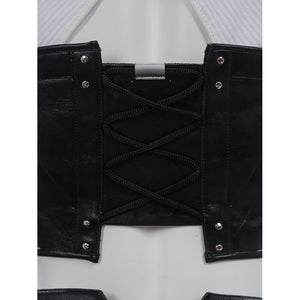 Tifa cosplay costume laces the black faux leather corset with cord straps and reinforces the edges with metal rivets.
