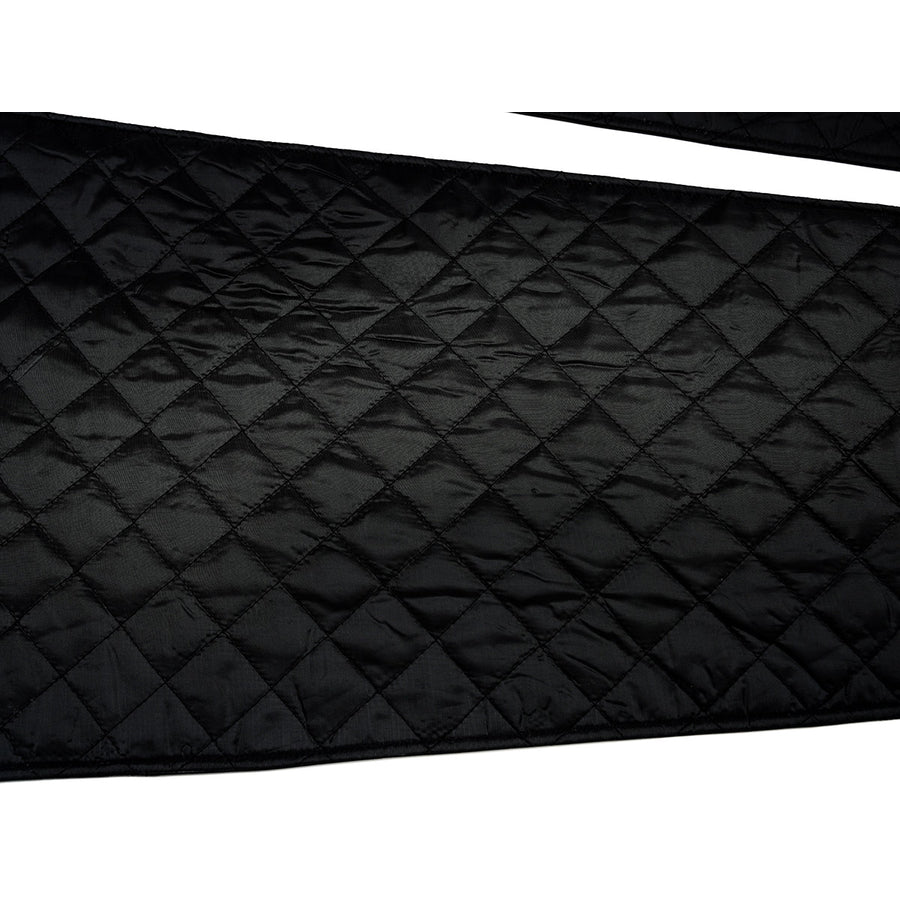 Tifa cosplay costume traces intricate diamond stitching across the surface of the soft black quilted lining material.