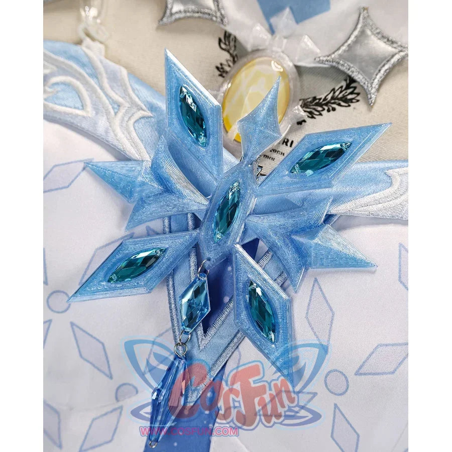 Tsaritsa cosplay costume chest ornament close-up with blue gem-like pieces in a snowflake design.